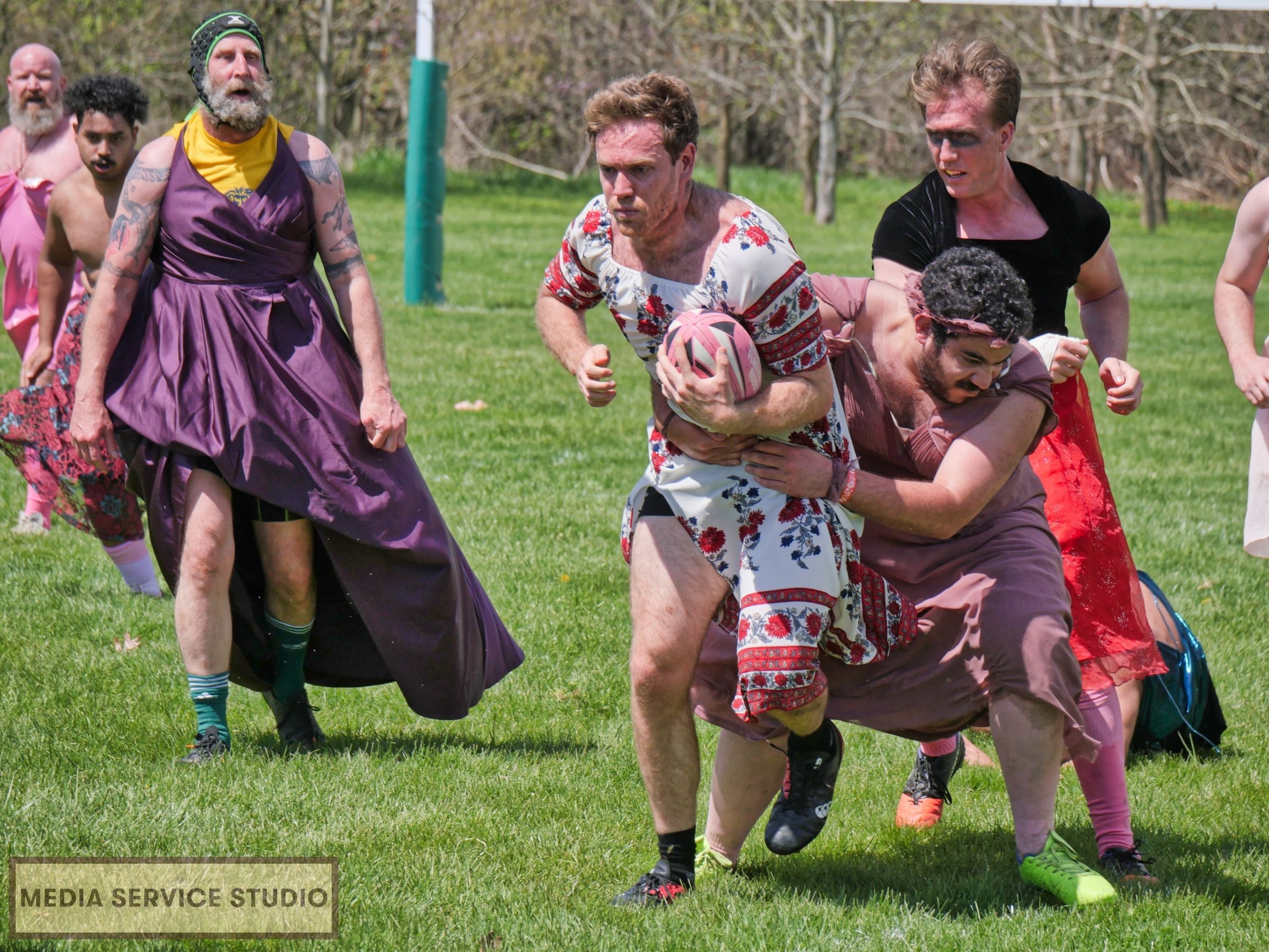 Baltimore Flamingos Rugby Team. Prom Dress Rugby Event. LGBTQ
